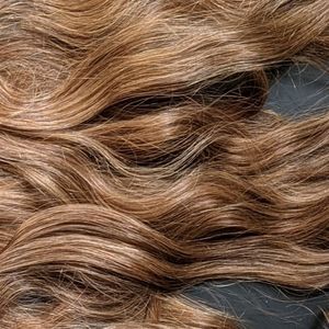 19" clip in Remy human hair extensions dark blonde